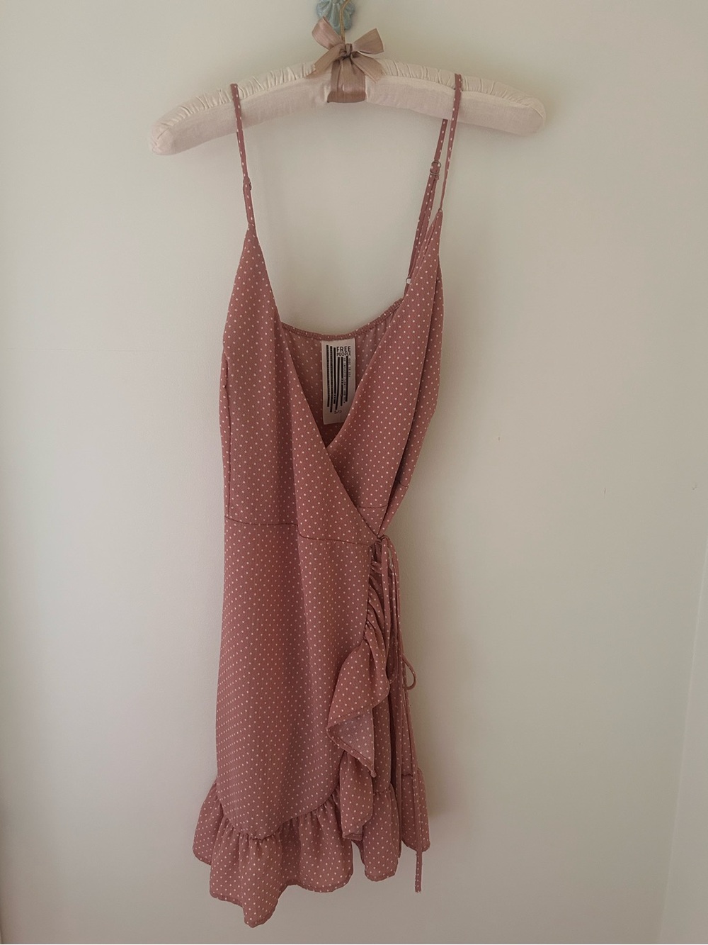 Intimately Free People “All My Love” Polka Dot Wrap Mini Dress
Size: Small
NWT